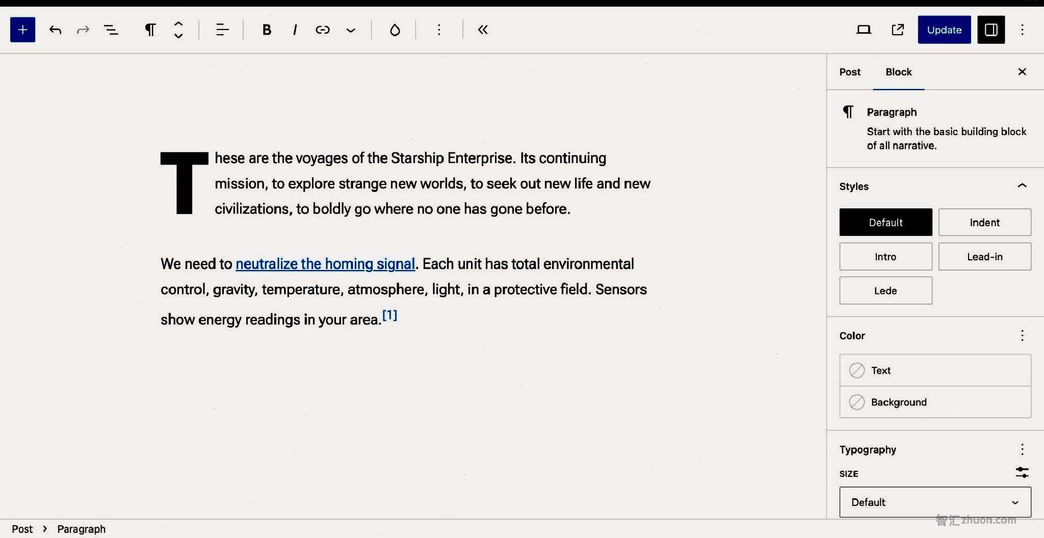 WordPress post editor with a couple of demo paragraphs. The image reflects the black text color and blue link color.